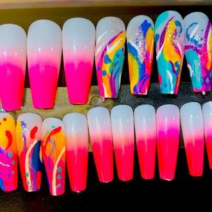 24 Nails various sizes. With free manicure set and sticky tabs